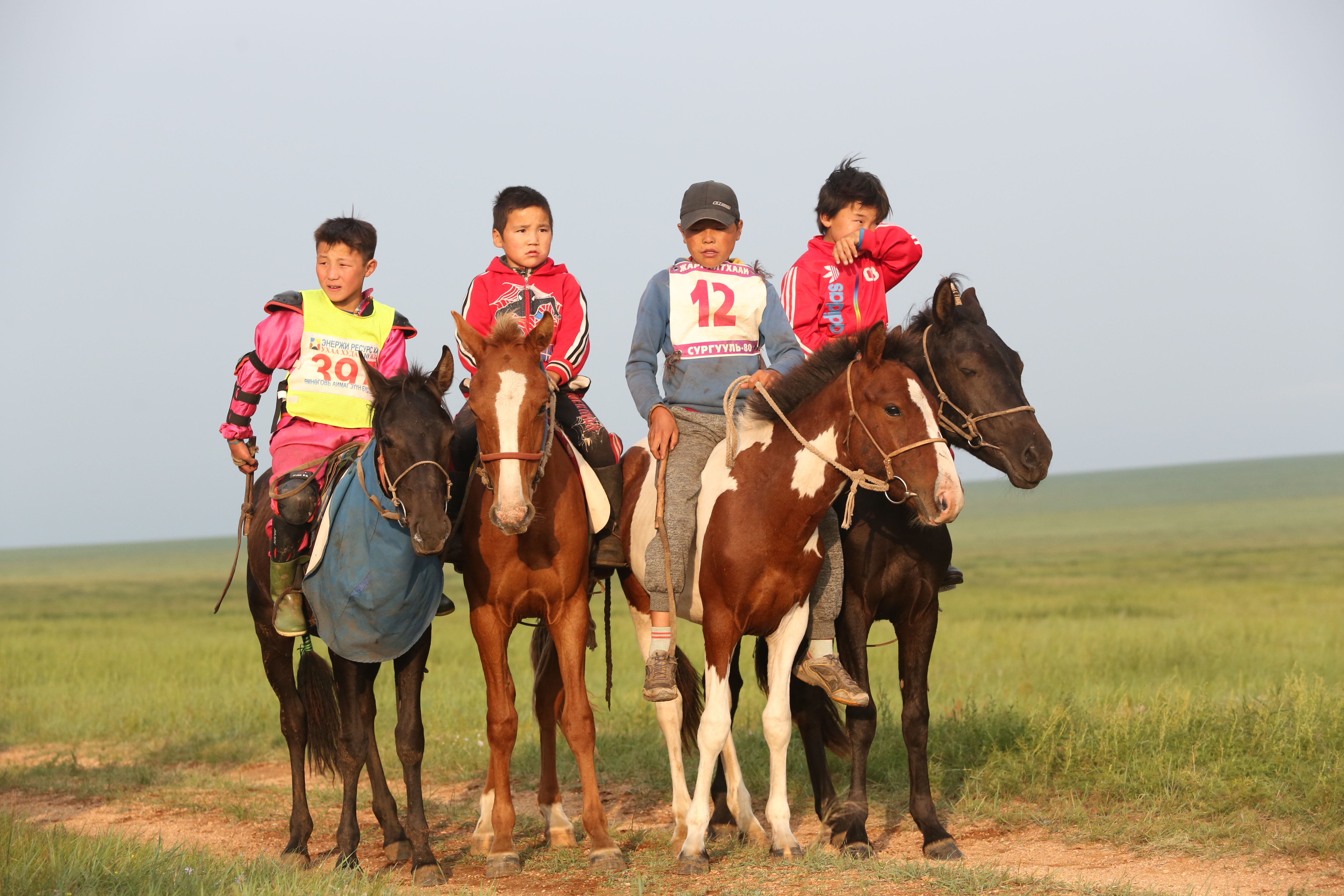 Jockeys of the Steppe Horse racing is the #1 sport in Mongolia and young boys are the jockeys. These locals show their amazing riding skills to the officials and riders! Jockeys of the Steppe Horse racing is the #1 sport in Mongolia and young boys are the jockeys. These locals show their amazing riding skills to the officials and riders!